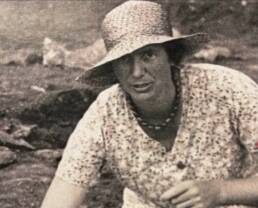 head and shoulders photo of Helen O'Neill working on the site