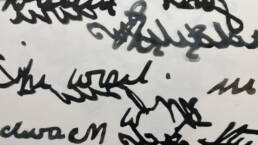 black and grey cut out text layered (extracts from letter)